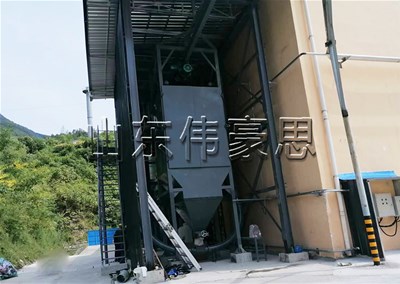 化工污泥噸袋拆包機是怎樣完成自動化拆包的？